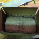 decal around a balloon in a box