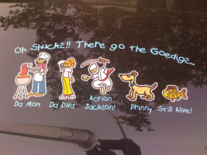 family sticker on a cars window glass